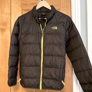 The North Face Boys Large winter jacket. Grey with bright yellow zippers/ logo.